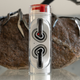 The Nothing Ear (stick)'s charging case twisted open revealing the earbuds made accessible.